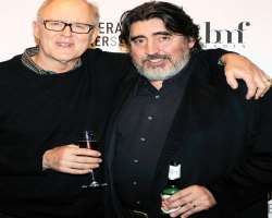 Alfred Molina consuming alcohol